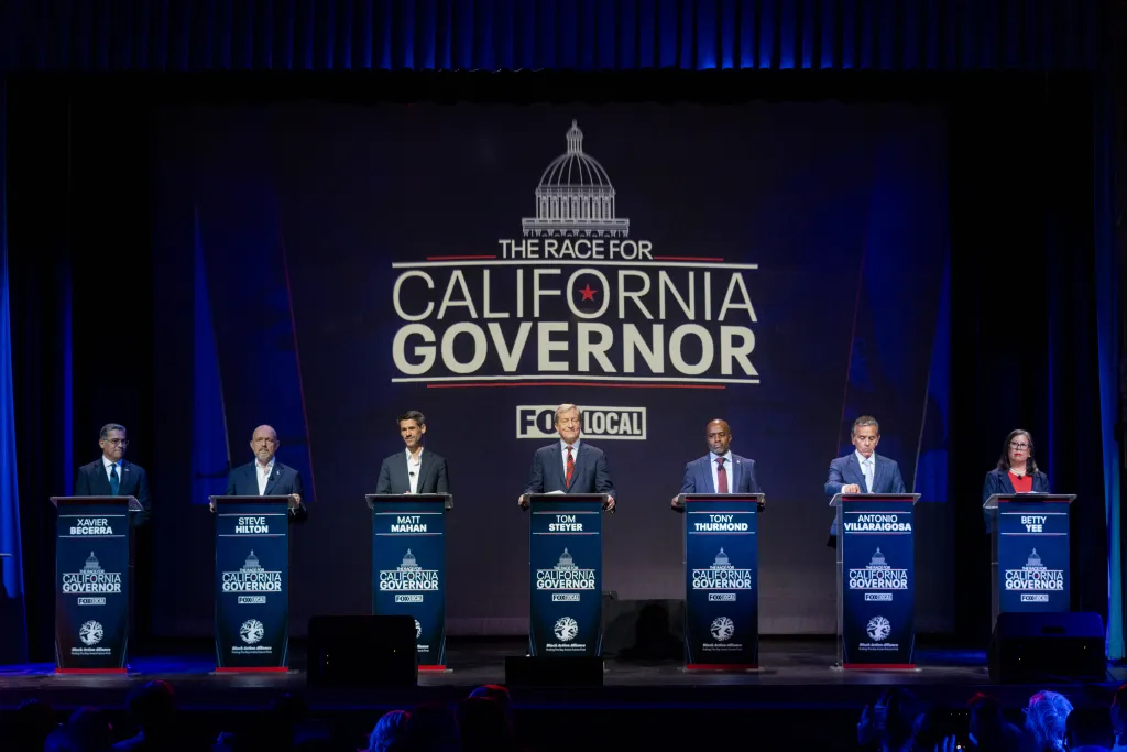 California gubernatorial candidates Xavier Becerra, Steve Hilton, Matt Mahan, Tom Steyer, Tony Thurmond, Antonio Villaraigosa, and Betty Yee at a debate in San Francisco.