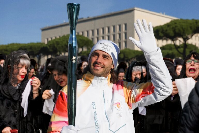 SATIRE NEWS: Olympic Torch Followed By Thousands Of Wailing, Black Shawled