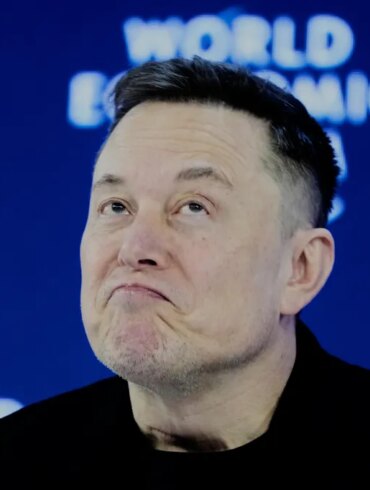 Elon Musk making a face at the World Economic Forum.
