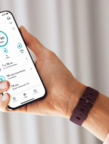 The Fitbit Charge 4 and the Fitbit app