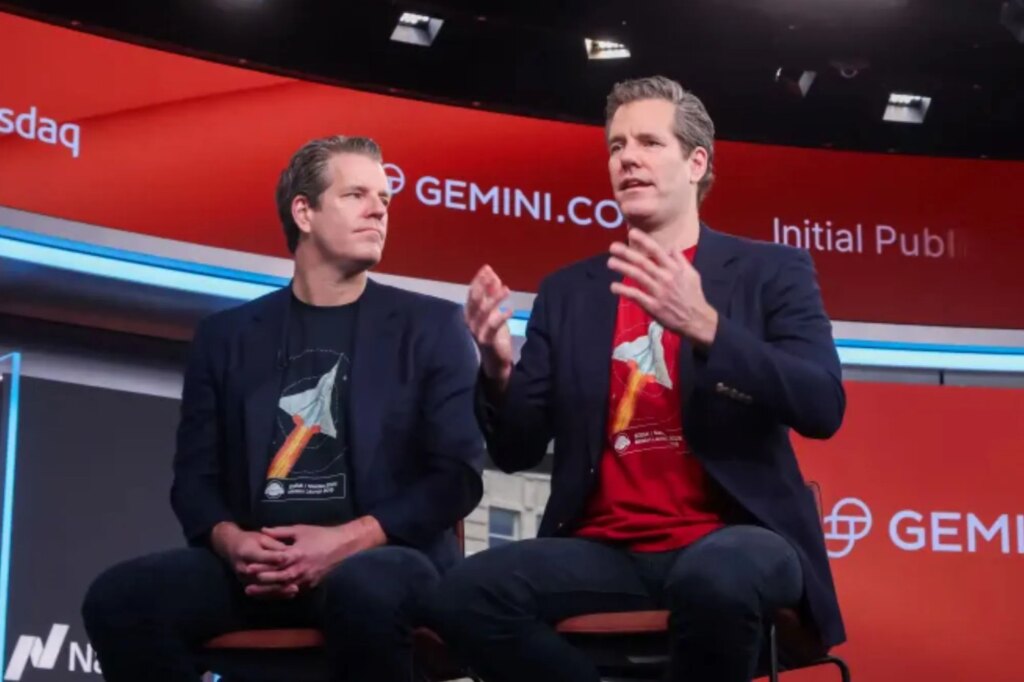 SCIENCE & TECH: Winklevoss twins' Gemini crypto exchange cuts 25%