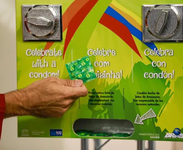 Condom dispensers, like this one at the 2016 Summer Olympics, are running dry at the Milan-Cortina Winter Olympics.