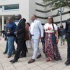 Attorney Ben Crump, second from left, walks with Ron Lacks, left, Alfred Lacks Carter, third from left, both grandsons of Henrietta Lacks, and other descendants of Lacks, outside the federal courthouse in Baltimore in 2021. Novartis settled a lawsuit with the Lacks estate this month that alleged the pharmaceutical giant unjustly profited off her cells.