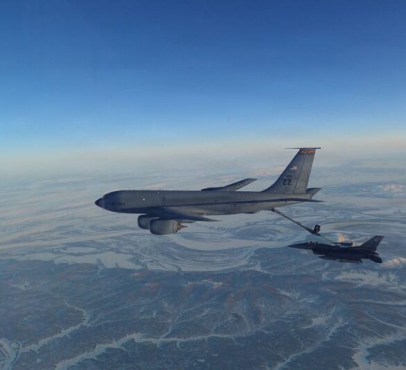 IN FLIGHT - ALASKA, UNITED STATES: (EDITOR’S NOTE: This Handout image was provided by a third-party organization and may not adhere to Getty Images’ editorial policy.) In this handout photo provided by the U.S. Department of War, a North American Aerospace Defense Command (NORAD) F-16 Fighting Falcon fighter refuels from a KC-135 Stratotanker over Western Alaska Feb. 19, 2026. NORAD employs a layered defense network of satellites, ground-based and airborne radars and fighter aircraft to detect and track aircraft and inform appropriate actions. NORAD remains ready to employ a number of response options in defense of North America and meeting presence with presence. (Handout Photo by U.S. Department of War/Getty Images)