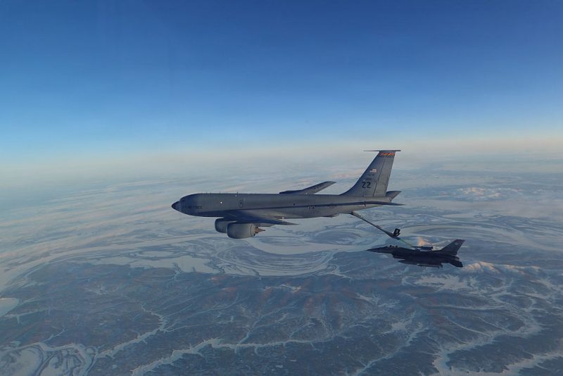 IN FLIGHT - ALASKA, UNITED STATES: (EDITOR’S NOTE: This Handout image was provided by a third-party organization and may not adhere to Getty Images’ editorial policy.) In this handout photo provided by the U.S. Department of War, a North American Aerospace Defense Command (NORAD) F-16 Fighting Falcon fighter refuels from a KC-135 Stratotanker over Western Alaska Feb. 19, 2026. NORAD employs a layered defense network of satellites, ground-based and airborne radars and fighter aircraft to detect and track aircraft and inform appropriate actions. NORAD remains ready to employ a number of response options in defense of North America and meeting presence with presence. (Handout Photo by U.S. Department of War/Getty Images)