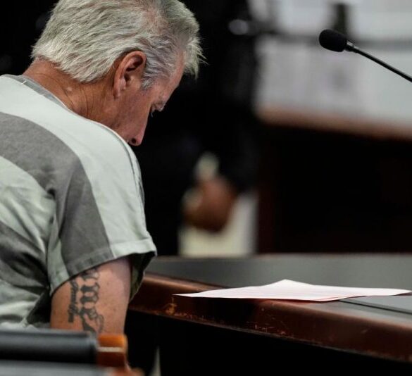 WINDER, GEORGIA - SEPTEMBER 6: Colin Gray, 54, the father of Apalachee High School shooting suspect Colt Gray, 14, sits in the Barrow County courthouse for his first appearance, on September 6, 2024, in Winder, Georgia. Colin Gray is being charged with involuntary manslaughter, second-degree murder and cruelty to children after his son opened fire and killed 4 at the high school on Wednesday. (Photo by Brynn Anderson-Pool/Getty Images)