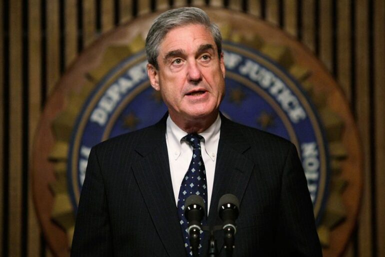 WASHINGTON - JUNE 25: FBI Director Robert Mueller speaks during a news conference at the FBI headquarters June 25, 2008 in Washington, DC. The news conference was to mark the 5th anniversary of Innocence Lost initiative. (Photo by Alex Wong/Getty Images)