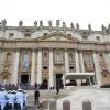 Pope Leo XIV delivers his speeck during the weekly general audience as portraits of late Italian teenager Carlo Acutis (R) and late Pier Giorgio Frassati (L) are displayed onto the facade of Saint Peter's Basilica in the background, in the Vatican on September 10, 2025. (Photo by Andreas SOLARO / AFP) (Photo by ANDREAS SOLARO/AFP via Getty Images)