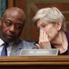 WASHINGTON, DC - FEBRUARY 05: Chair of the Senate Committee on Banking, Housing, and Urban Affairs Sen. Tim Scott (R-SC) talks to Ranking Member Sen. Elizabeth Warren (D-MA) as U.S. Treasury Secretary Scott Bessent testifies before the committee in the Dirksen Senate Office Building on February 05, 2026 in Washington, DC. The Committee met to hear testimony on the Financial Stability Oversight Council’s Annual Report to Congress. (Photo by Kevin Dietsch/Getty Images)