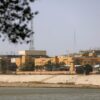 The US embassy headquarters in Iraq is pictured in Baghdad's fortified "Green Zone" on March 8, 2026. Air defence systems intercepted rockets fired at the US embassy in Baghdad late on March 7, security sources told AFP. It is the first such attack on the embassy in Baghdad since the start of the war in the Middle East, triggered by a joint US-Israeli attack on Iran, into which Iraq has been dragged. (Photo by AHMAD AL-RUBAYE / AFP via Getty Images)