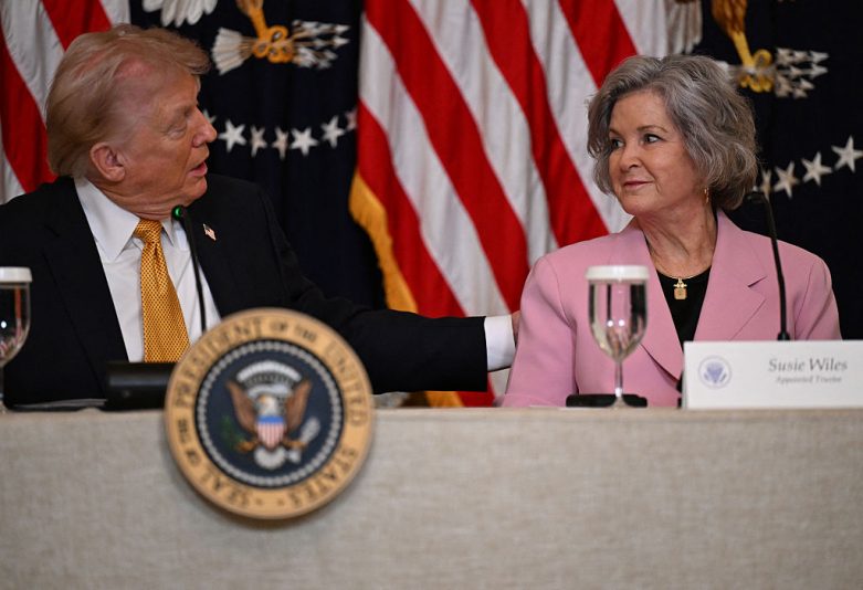 US President Donald Trump speaks with chief of staff Susie Wiles during a lunch with the "Trump Kennedy Center Board" Members at the White House in Washington, DC, March 16, 2026. US President Donald Trump's chief of staff Susie Wiles has been diagnosed with breast cancer but will continue to work during treatment, Trump said Monday. The first woman to ever work as White House chief of staff, 68-year-old Wiles has been widely credited with driving Trump's second presidency forward behind the scenes. (Photo by Annabelle GORDON / AFP via Getty Images)