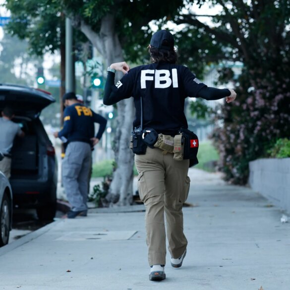 POLITICS: FBI, LAPD target gang menace