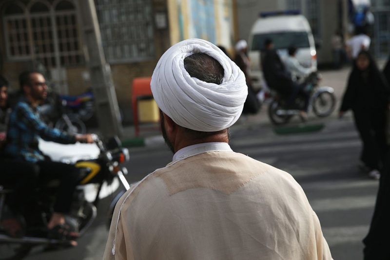 QOM, IRAN - JUNE 03: An Islamic mullah walks through the streets on June 3, 2014 in Qom, Iran. Iran is marking the 25th anniversary of the death of the Ayatollah Khomeini and his legacy of the Islamic Revolution. (Photo by John Moore/Getty Images)