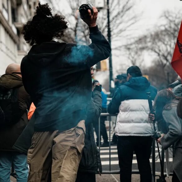 A suspect throws a handmade explosive at supporters of U.S. President Donald Trump during a rally to stop public Muslim prayer, in New York City, U.S., March 7, 2026.