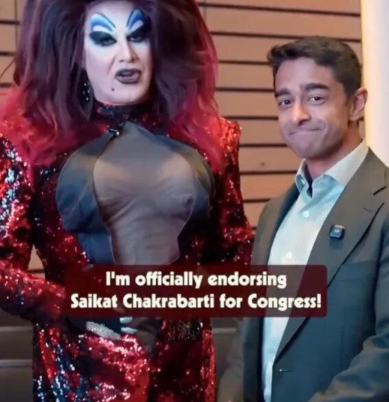 A drag queen in a red sequined dress endorsing Saikat Chakrabarti for Congress.