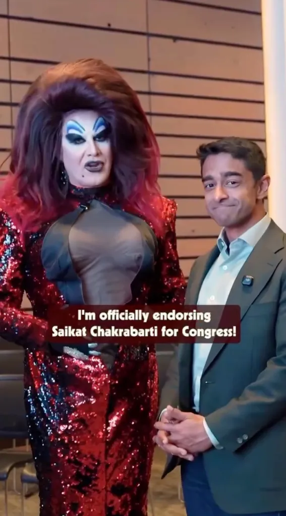 A drag queen in a red sequined dress endorsing Saikat Chakrabarti for Congress.