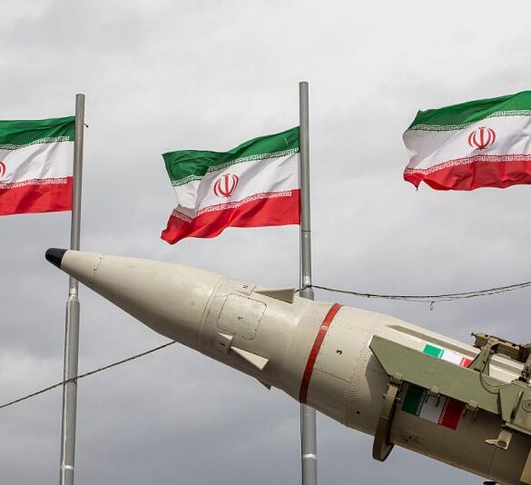 TEHRAN, IRAN - FEBRUARY 11: Missiles produced by Iran's armed forces are displayed near a row of Iranian flags during commemorations to mark the anniversary of the 1979 Iranian Revolution on February 11, 2026 in Tehran, Iran. In that year, Ruhollah Khomeini led an overthrow of the Pahlavi dynasty in 1979 and established himself as Supreme Leader of the Islamic Republic of Iran. (Photo by Majid Saeedi/Getty Images)
