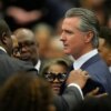 California Gov. Gavin Newsom arrives at Reverend Jesse Jackson's Public Homegoing Service.