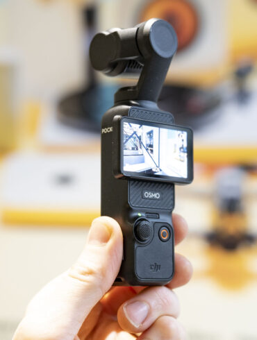 DJI Osmo Pocket 3 vlogging camera in user's hand