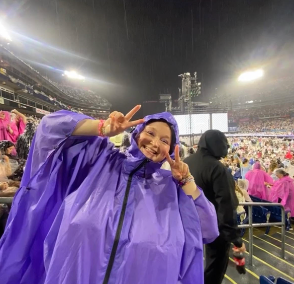 The author after postponing her third round of chemotherapy to be able to go to The Eras Tour in Nashville.